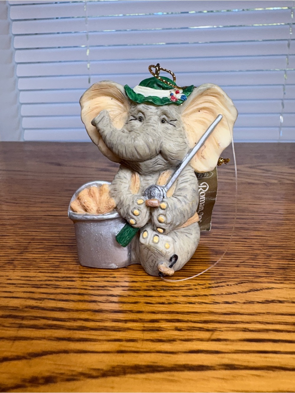 Vintage Festive Elephant Fishing Ornament in Green Hat